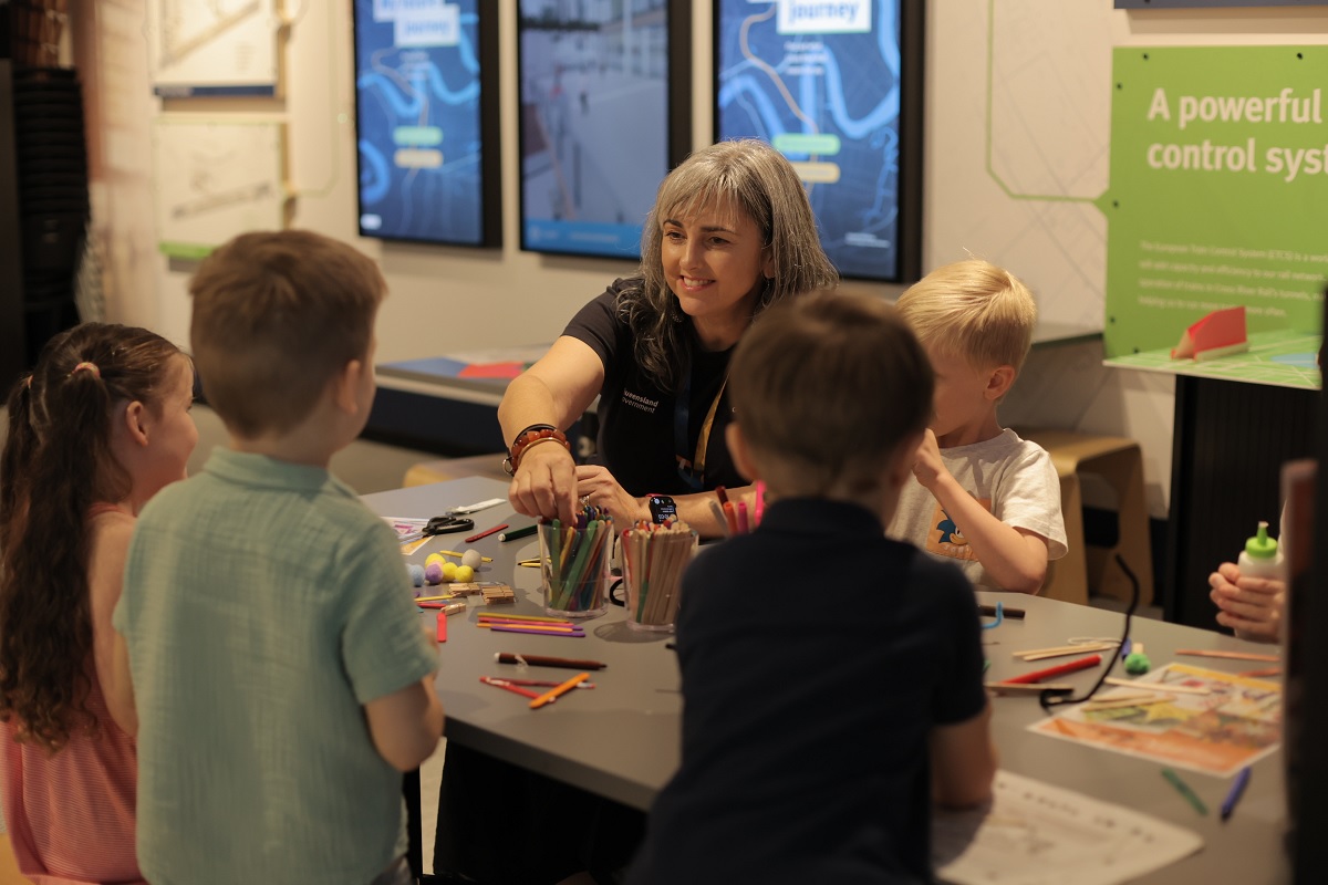 Kids working on a colouring activity.